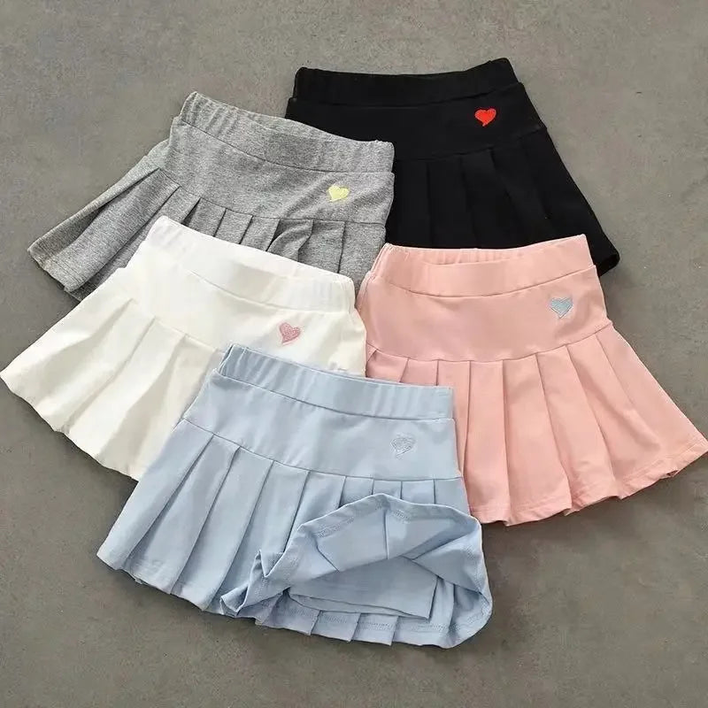 Falda Plisada con Short Interior – Comodidad y Seguridad para tu Niña
