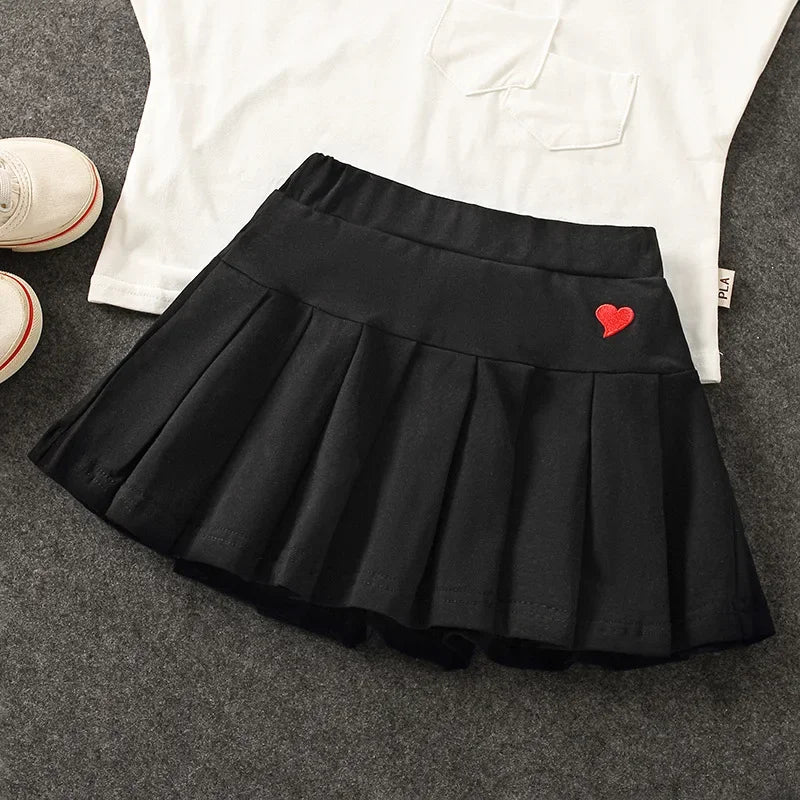 Falda Plisada con Short Interior – Comodidad y Seguridad para tu Niña