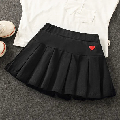 Falda Plisada con Short Interior – Comodidad y Seguridad para tu Niña