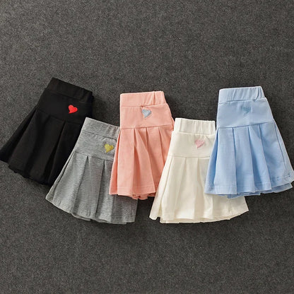 Falda Plisada con Short Interior – Comodidad y Seguridad para tu Niña