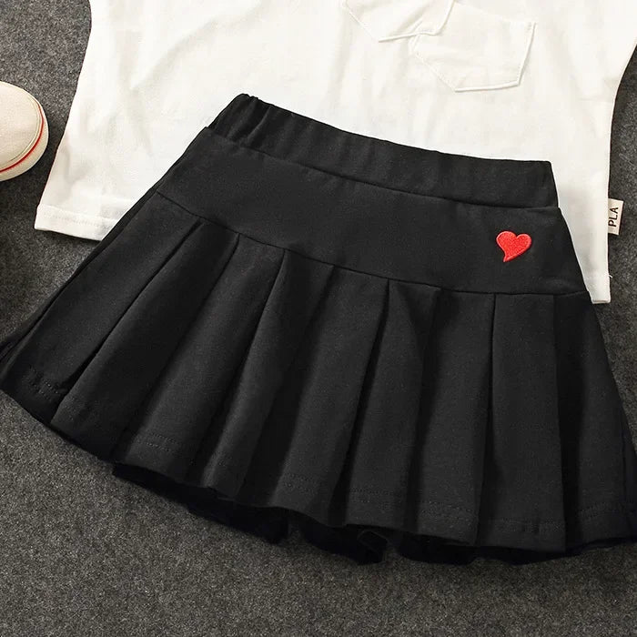 Falda Plisada con Short Interior – Comodidad y Seguridad para tu Niña