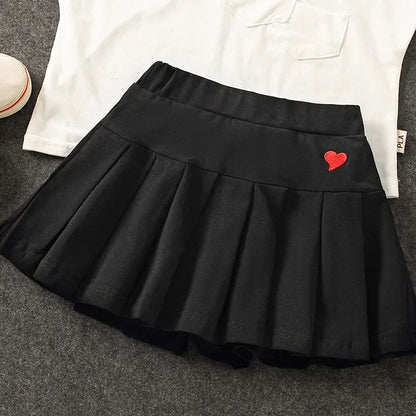 Falda Plisada con Short Interior – Comodidad y Seguridad para tu Niña