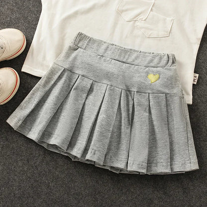 Falda Plisada con Short Interior – Comodidad y Seguridad para tu Niña