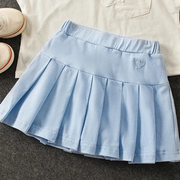Falda Plisada con Short Interior – Comodidad y Seguridad para tu Niña