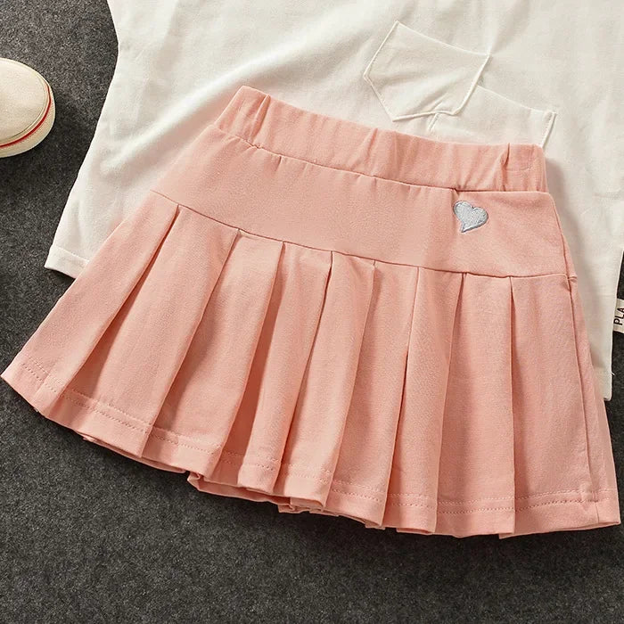 Falda Plisada con Short Interior – Comodidad y Seguridad para tu Niña