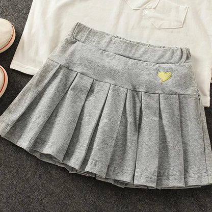 Falda Plisada con Short Interior – Comodidad y Seguridad para tu Niña